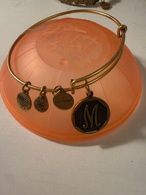 Alex and Ani Gold Tone Charm Bangle with Black 'M' Octagon